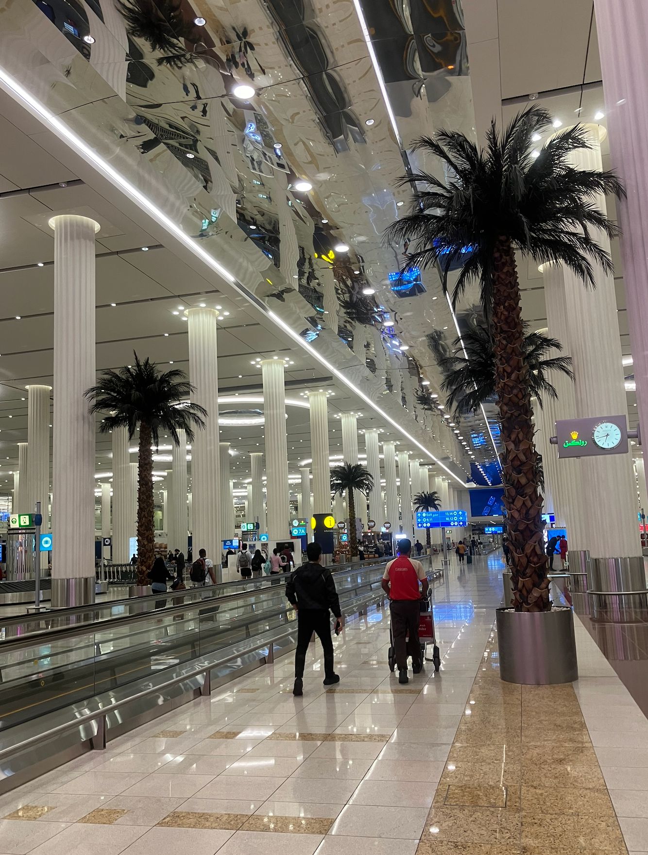 Digital display showing next train to Expo 2020 departing in 3 minutes at a station platform