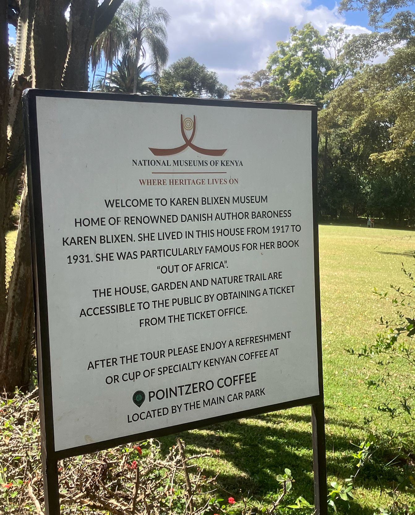 Welcome sign for Karen Blixen Museum at National Museums of Kenya, describing the author's residence from 1917-1931