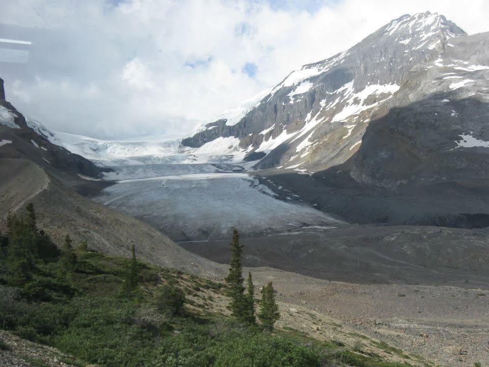Athabasca Glacier and surrounding peaks in the Canadian Rocky Mountains with snow-covered slopes