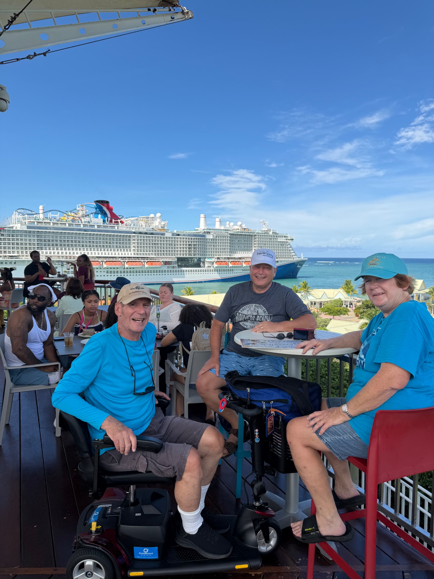 Group photo of approximately 25 people at Thing 1 and Thing 2 birthday breakfast on ship